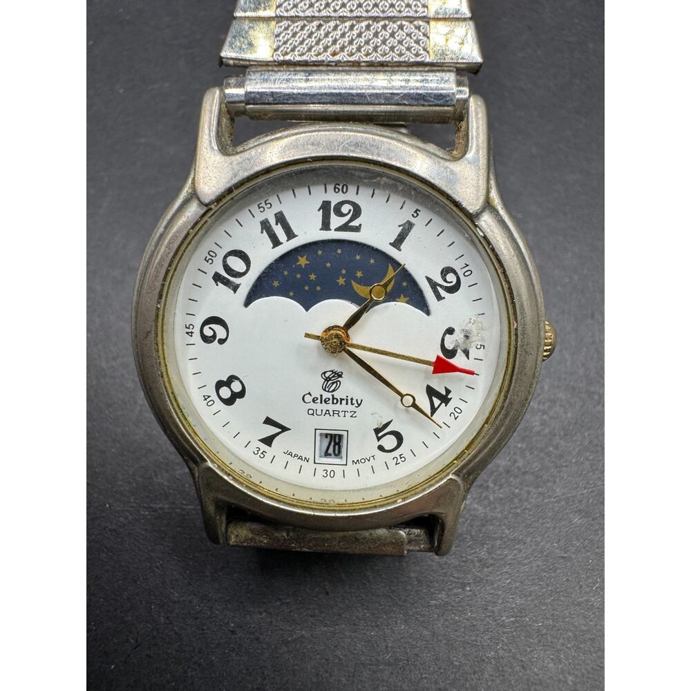 Vintage Celebrity Quartz Moonphase Date Watch Silver Tone Stretch Band 33.4MM